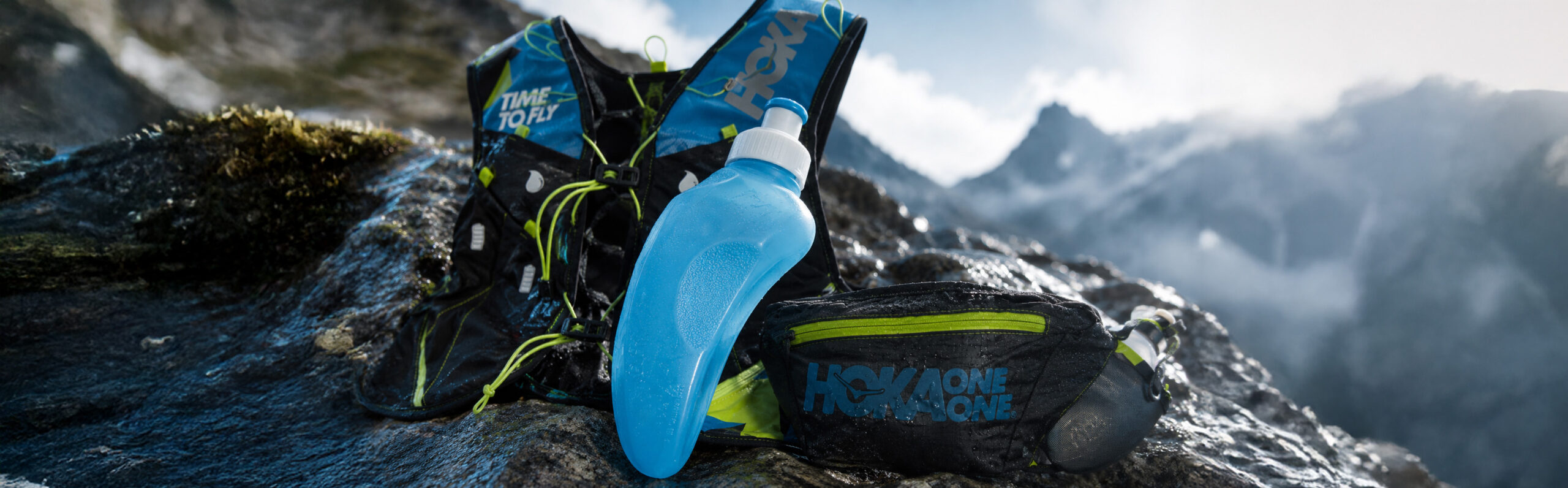 HOKA ONE ONE adaptive hydration system for trail running including soft flask and technical vest